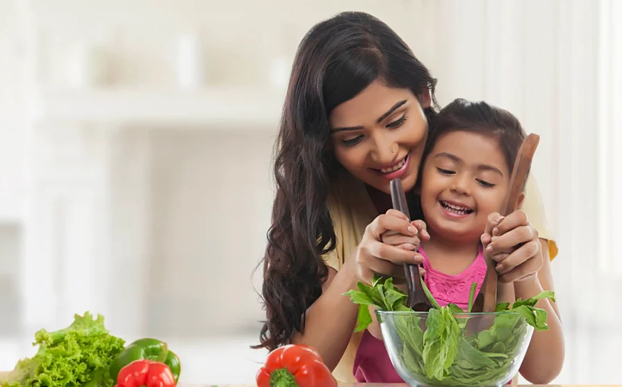 Kids eating vegetables