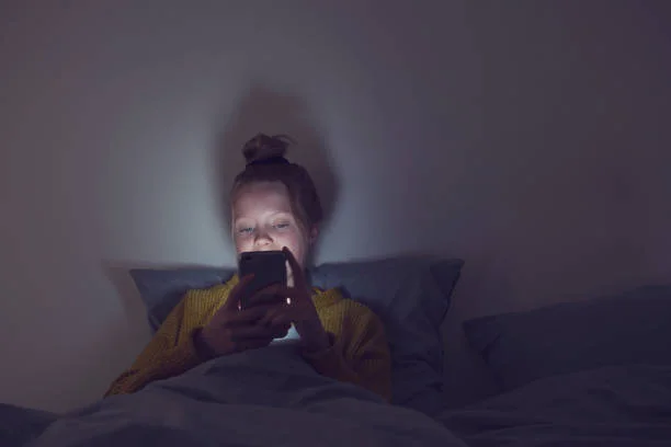 image of kid using Phone